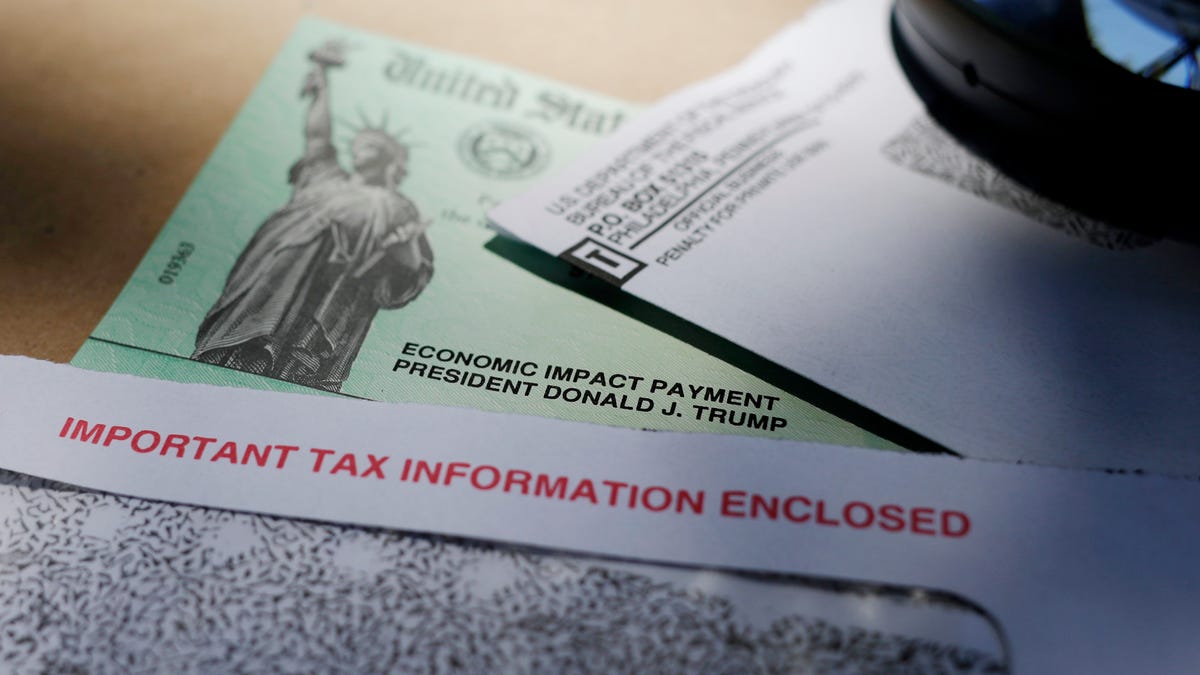 Economic Impact Payment checks will continue to be mailed in May and run through June, and possibly later. In this April 23, 2020,  photo, President Donald Trump's name is seen on a stimulus check issued by the IRS to help combat the adverse economic effects of the COVID-19 outbreak.  (AP Photo/Eric Gay, File)