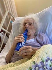 Jennie Stejna is treated to a cold Bud Light to celebrate her recovery from COVID-19.