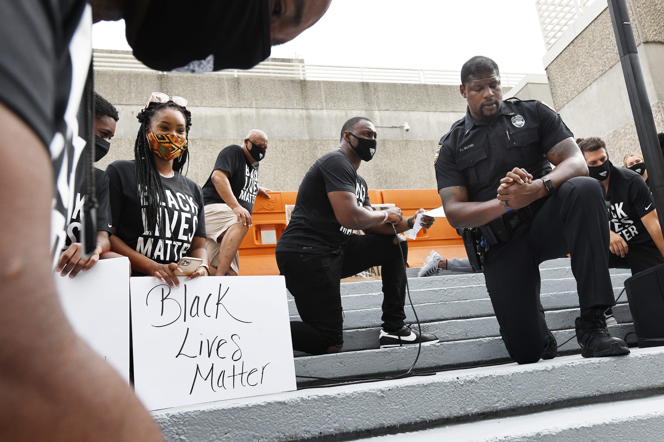 Police Take A Knee In Solidarity With George Floyd Protesters