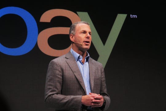 Devin Wenig, president of eBay marketplaces speaks at a news conference in Berlin on Sept. 26, 2013.