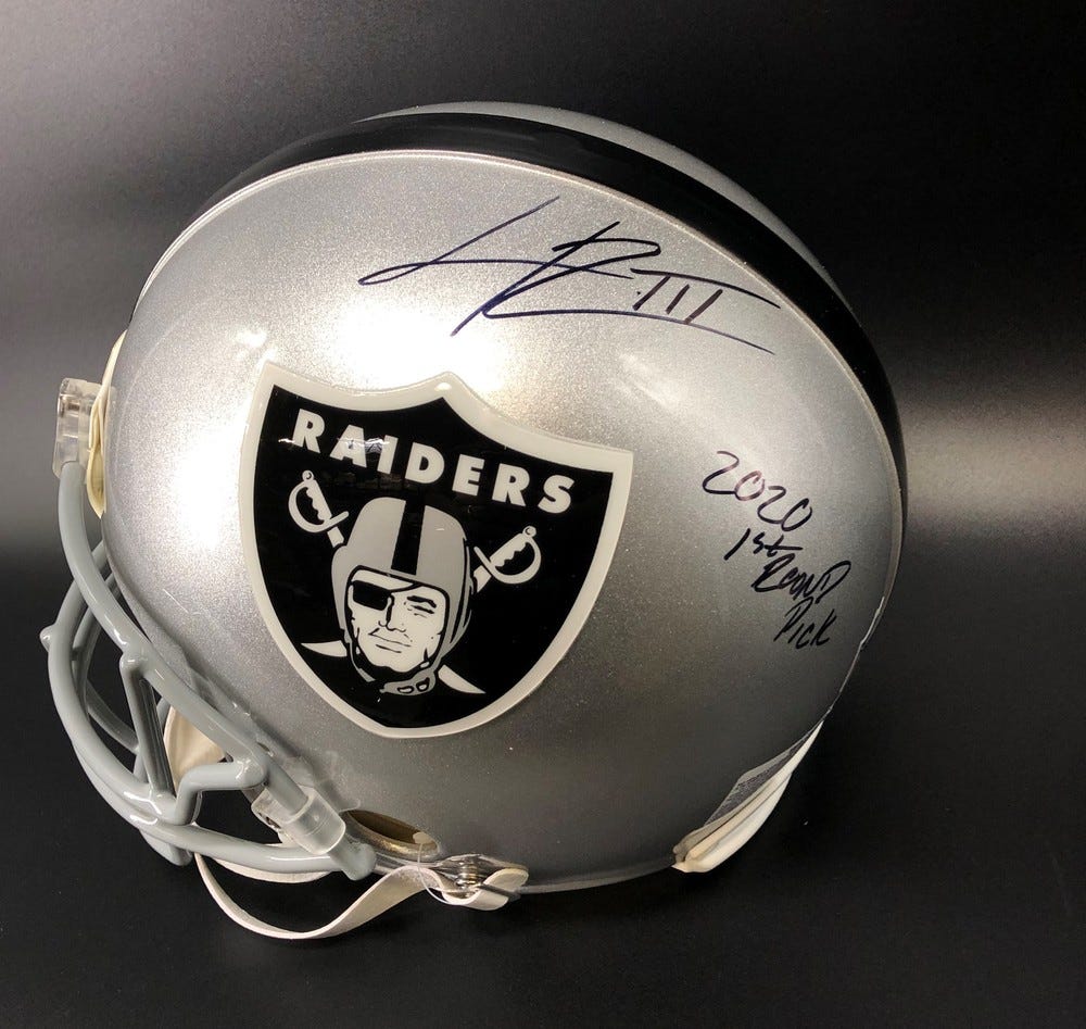 raiders autographed football