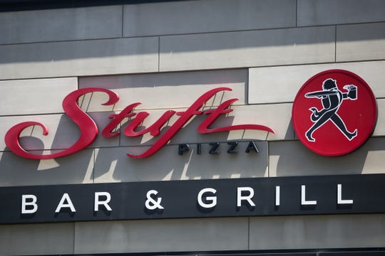 A sign for Stuft Pizza Bar & Grill sits on the exterior of the building on Monday, June 22, 2020 in Palm Desert, Calif.