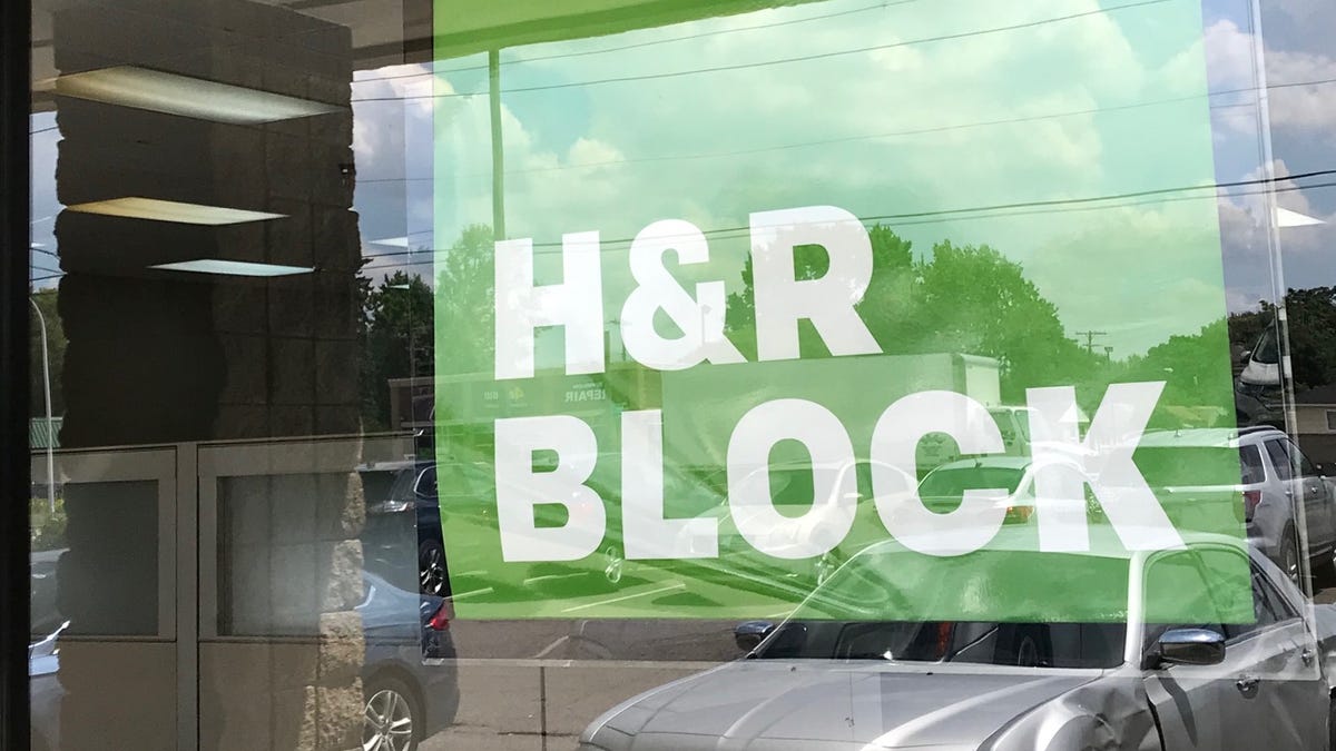 Some storefronts of national tax chains, such as H&R Block, are open for business in July as we approach a July 15 tax deadline. While most people have filed their taxes already, millions took advantage of a COVID-19 related extension. An H&R Block office window in Madison Heights, Mich., on July 1, 2020.