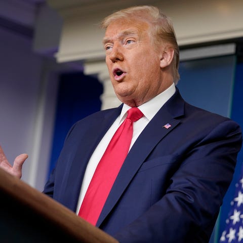 President Donald Trump speaks during a news briefi