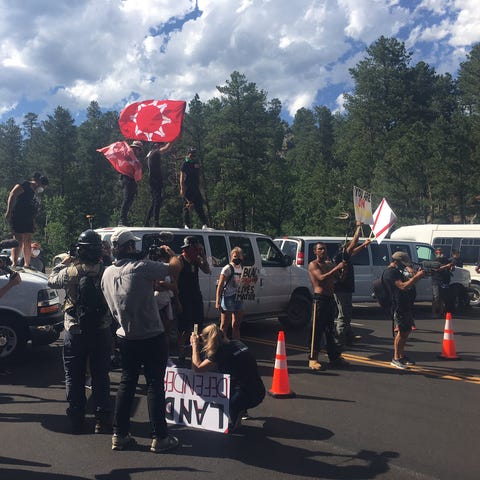 Protesters block Highway 16A outside of Keystone a