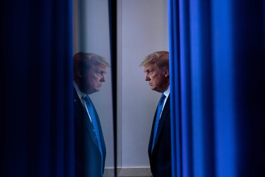 President Donald Trump arrives to speak to the press at the White House on July 22, 2020.