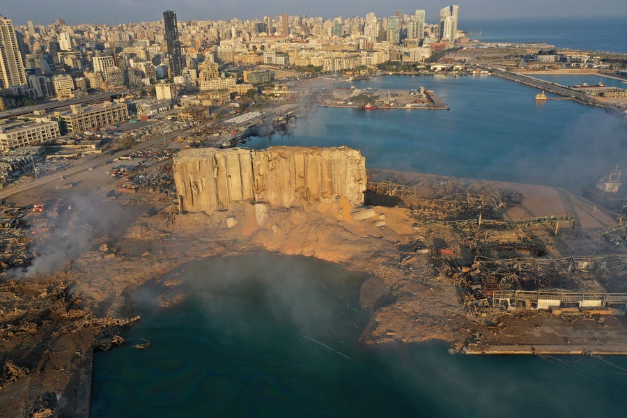 A drone photograph on Aug. 5, 2020 shows the scene of an explosion that hit the seaport of Beirut, Lebanon. A massive explosion rocked Beirut on Tuesday, flattening much of the city's port, damaging buildings across the capital and sending a giant mushroom cloud into the sky.