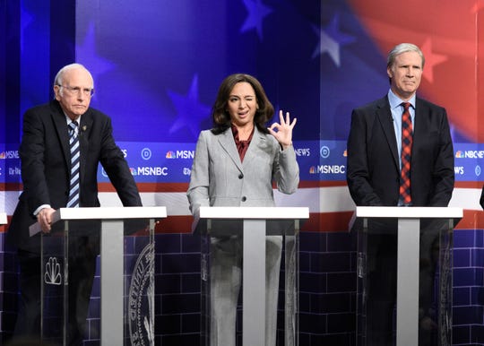 (l-r) Larry David as Bernie Sanders, Maya Rudolph as Kamala Harris, and host Will Ferrell as Tom Steyer during the "Democratic Debate" sketch on "Saturday Night Live" on November 23, 2019.