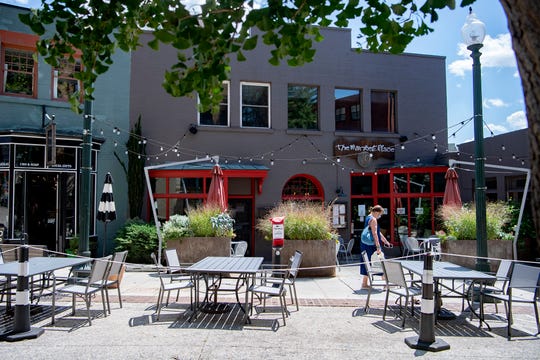 Tables expand seating outside of The Market Place, 20 Wall St., before service on Aug. 18, 2020. 