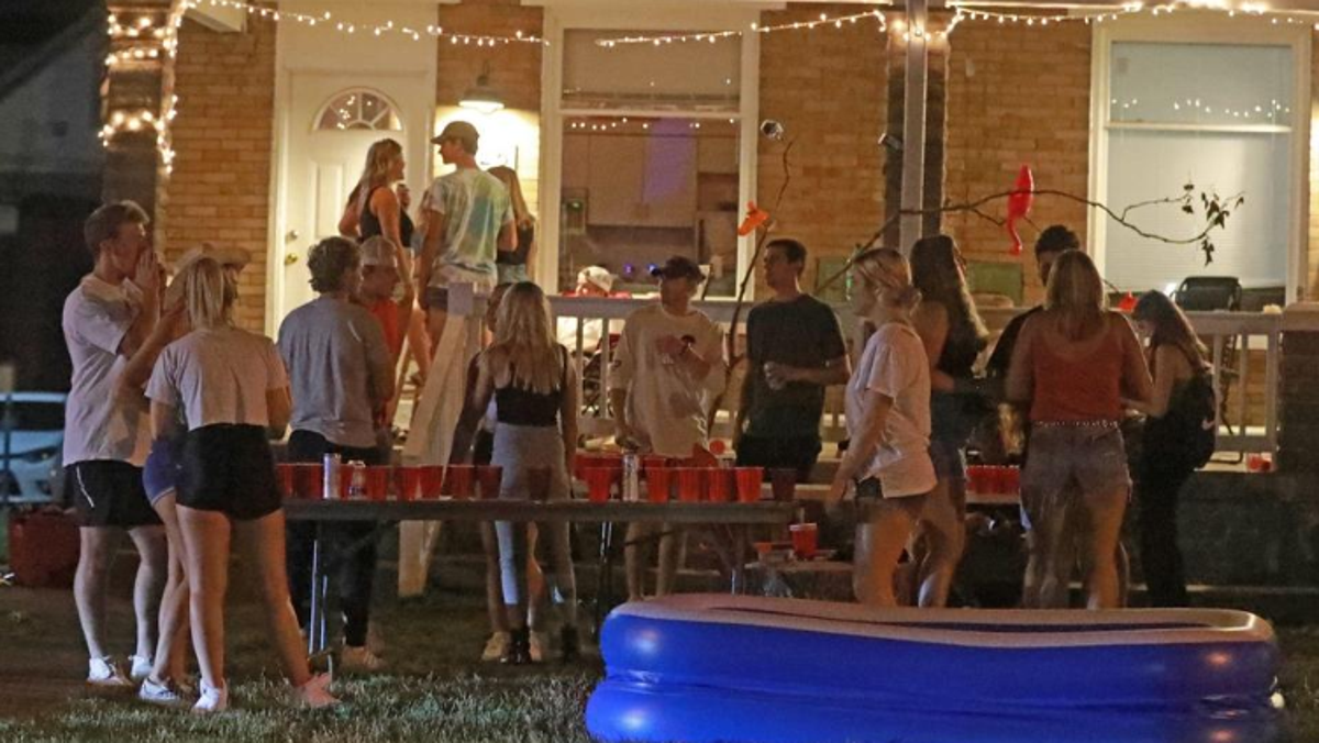 Off-campus yard and porch parties were packed  Aug. 20 near Ohio State University. Few masks were visible. A mix of online and in-person classes began Aug. 25 at the Columbus campus.