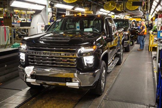 A Chevrolet Silverado full-size pickup truck is ready to roll off the assembly line on June 12, 2019, at the General Motors Flint Assembly Plant in Flint.