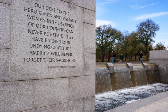 A view of the inscribed quote by President Harry Truman beginning, "Our debt to the heroic men and valiant women..." at the World War II Memorial in Washington DC.