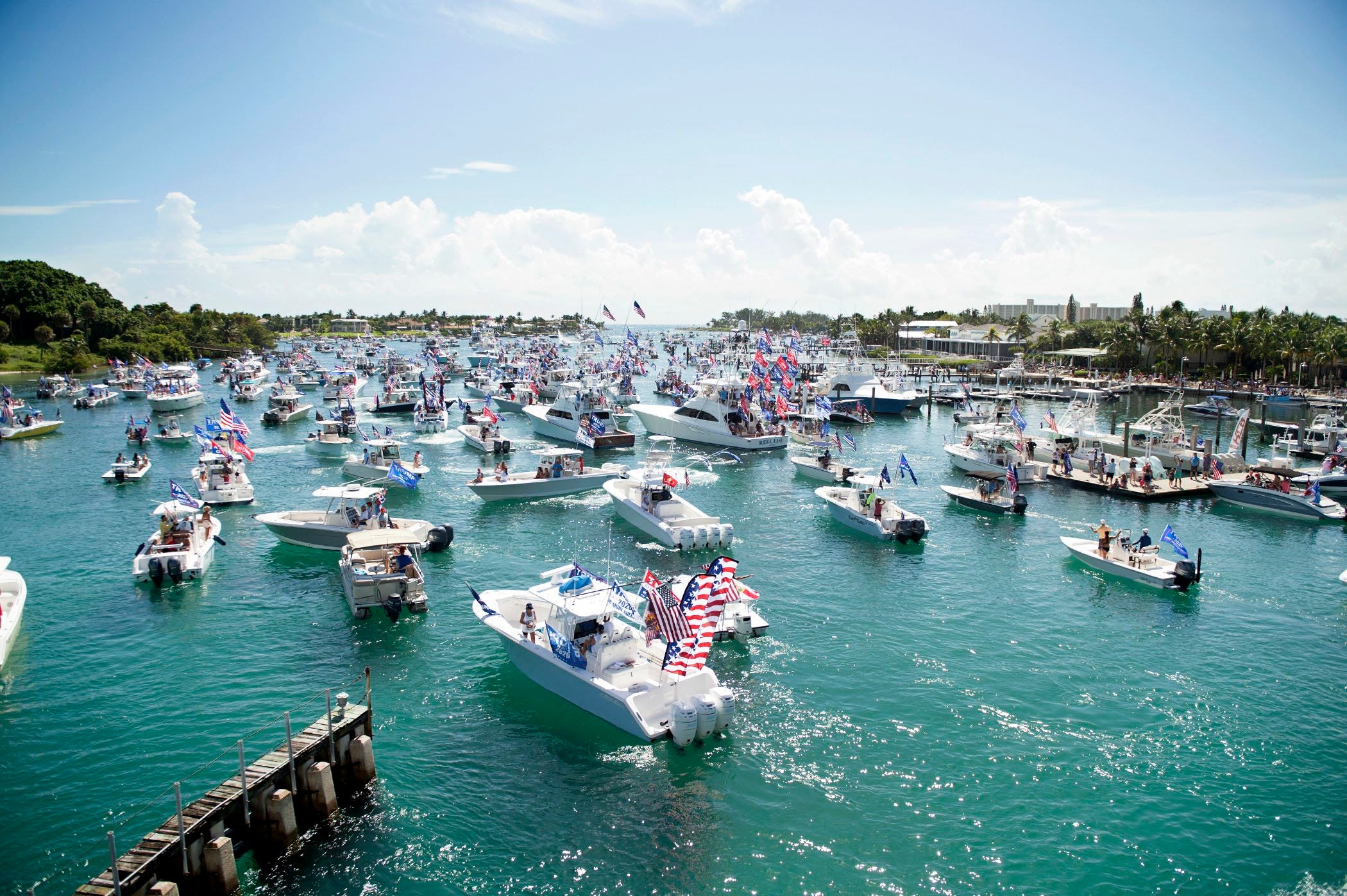 Labor Day Trump parade features boats, bikinis and parachutists