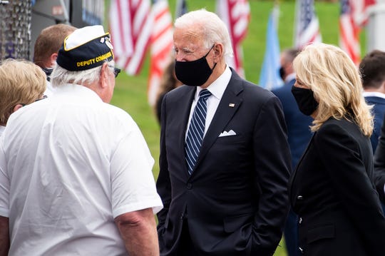 Former Vice President Joe Biden and Dr. Jill Biden talk with people during a visit to the Shanksville Volunteer Fire Department on Friday, September 11, 2020.