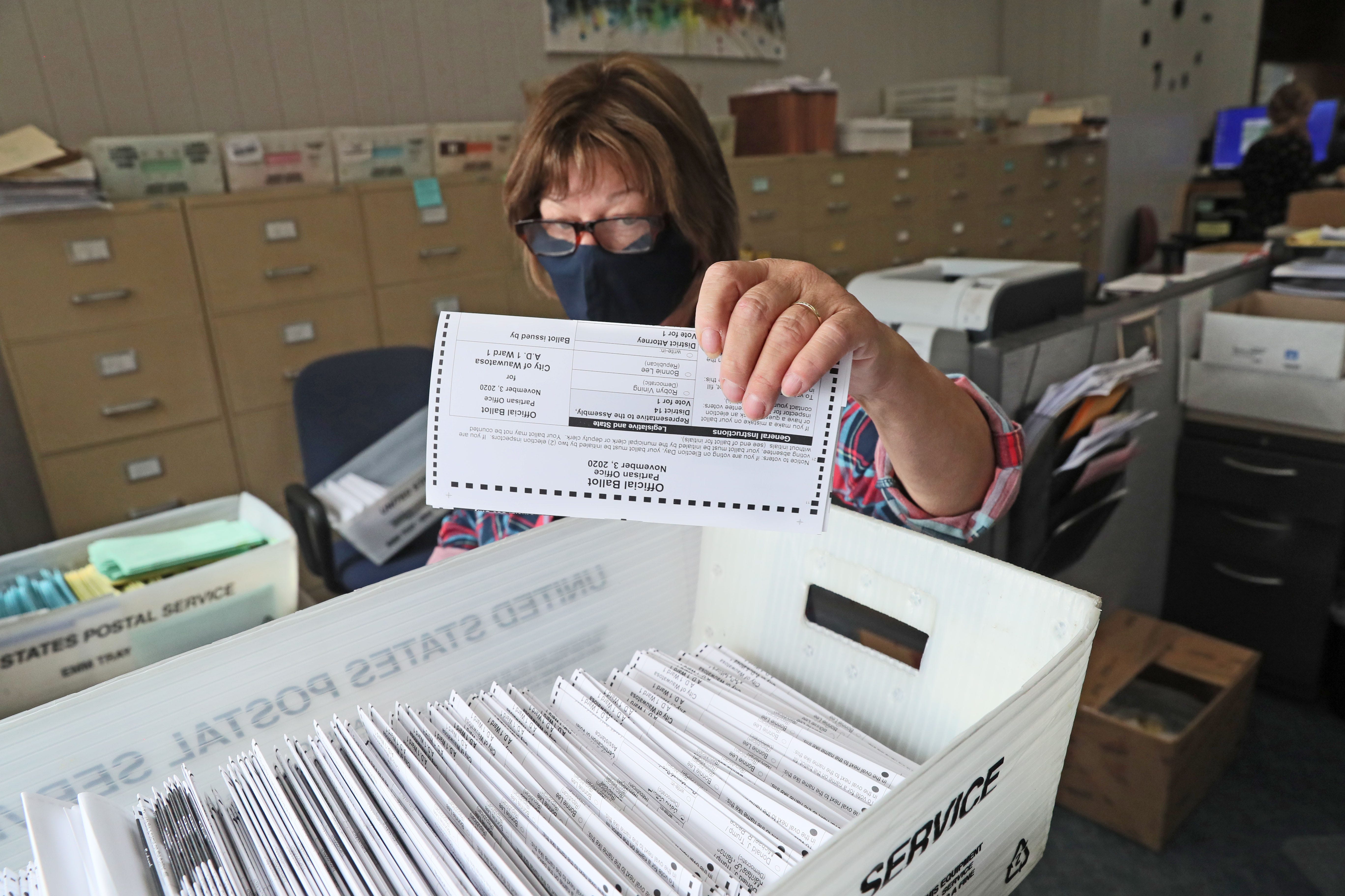 Absentee Voting: GOP And Democrats Urging Backers To Return Ballots