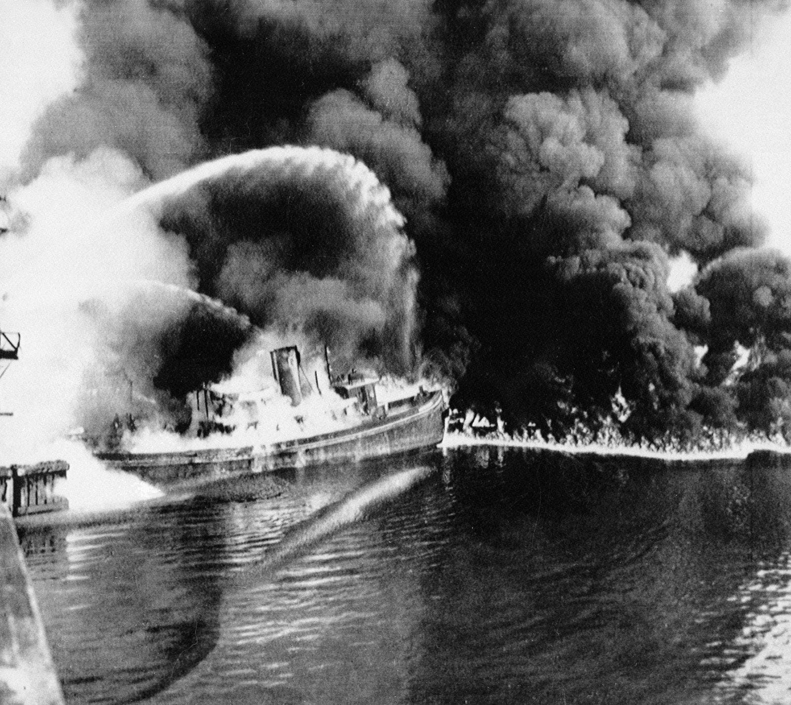 A fire tug fights flames on the Cuyahoga River near downtown Cleveland, Ohio, where oil and other industrial wastes caught fire on June 25, 1969. When Canada and the United States approved the first version of the Great Lakes Water Quality Agreement in 1972, the running joke in Cleveland was that anyone unlucky enough to fall into the Cuyahoga River would decay rather than drown.