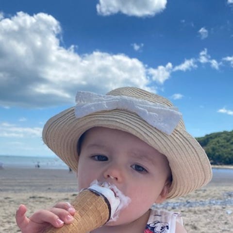 Phoebe Moon eating an ice cream cone.