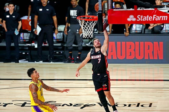 Heat guard Goran Dragic goes up for a layup against Los Lakers forward Kyle Kuzma during the second quarter.