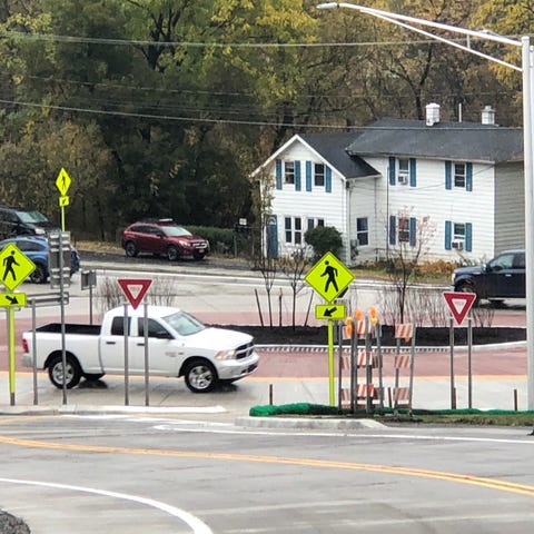 Motorists go round the roundabout that opened toda