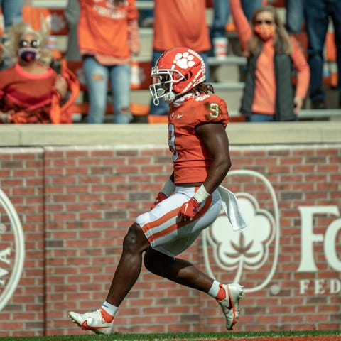 Clemson running back Travis Etienne scores a touch