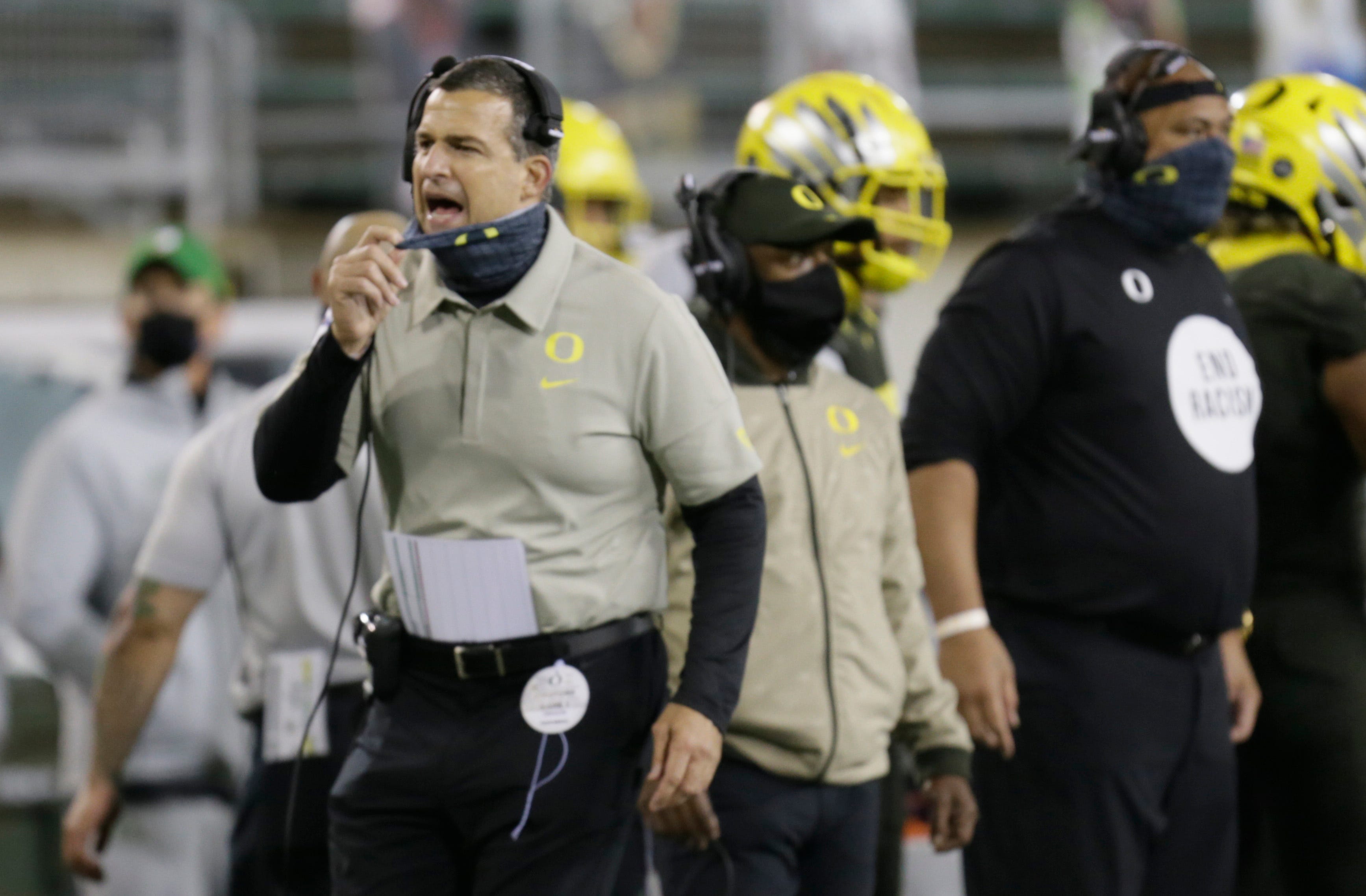 Oregon Ducks coach Mario Cristobal addresses Auburn 