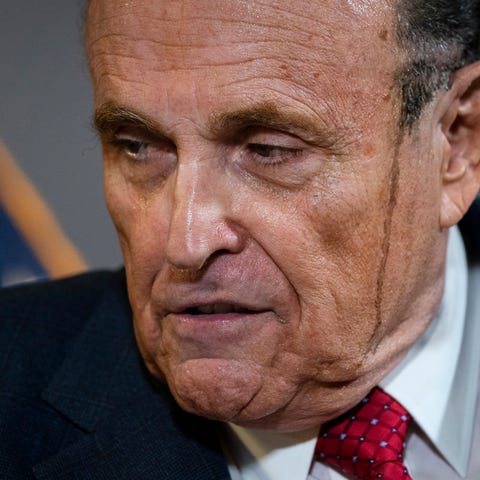 Rudy Giuliani speaks to the press about various la