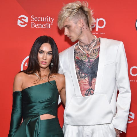 Megan Fox, left, and boyfriend Machine Gun Kelly a