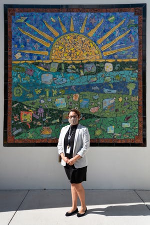 Principal Zulaika Quintero, who is the daughter of migrant farmworkers and grew up in Immokalee, poses for a portrait at RCMA Immokalee Community School on Wednesday, November 18, 2020. Quintero says the school focuses on reaching out to and supporting the parents of their students because, "their parents are their first teachers at home."