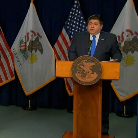 Gov. JB Pritzker tells reporters that Tier 3 mitig