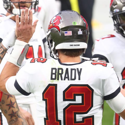 Buccaneers WR Mike Evans (13) celebrates with QB T