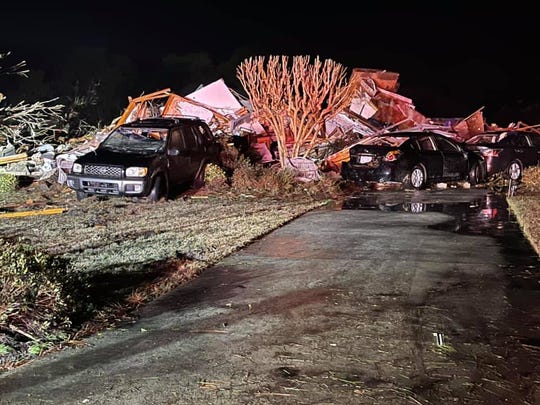 Debris and damage from a tornado that touched down near Ocean Isle Beach Monday night.