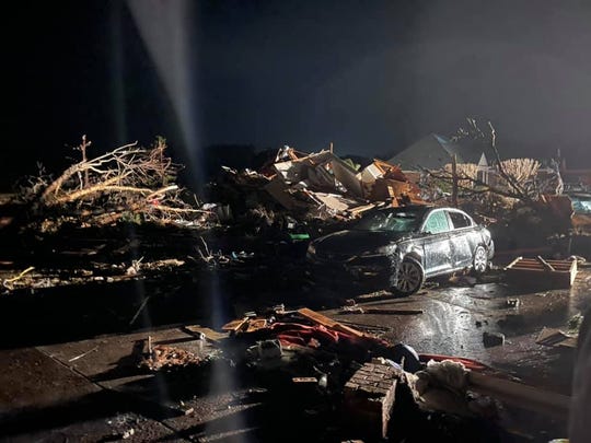 Debris and damage from a tornado that touched down near Ocean Isle Beach Monday night.