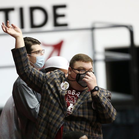 Cameron Luke Ratliff leads the cheers in the stude