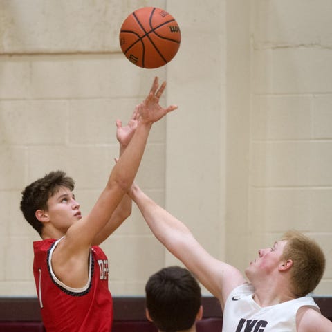 Deer Creek-Mackinaw senior John Blumeyer puts up a