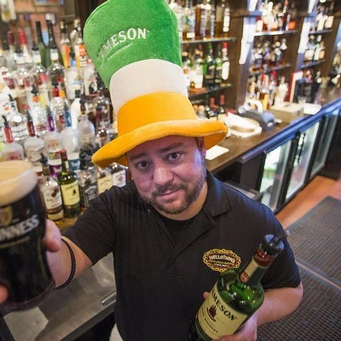 In this 2015 photo, bartender Matthew Ritterbusch 