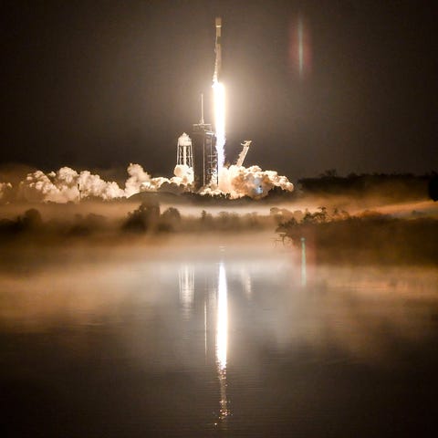 A SpaceX Falcon 9 rocket lifts off from Kennedy Sp