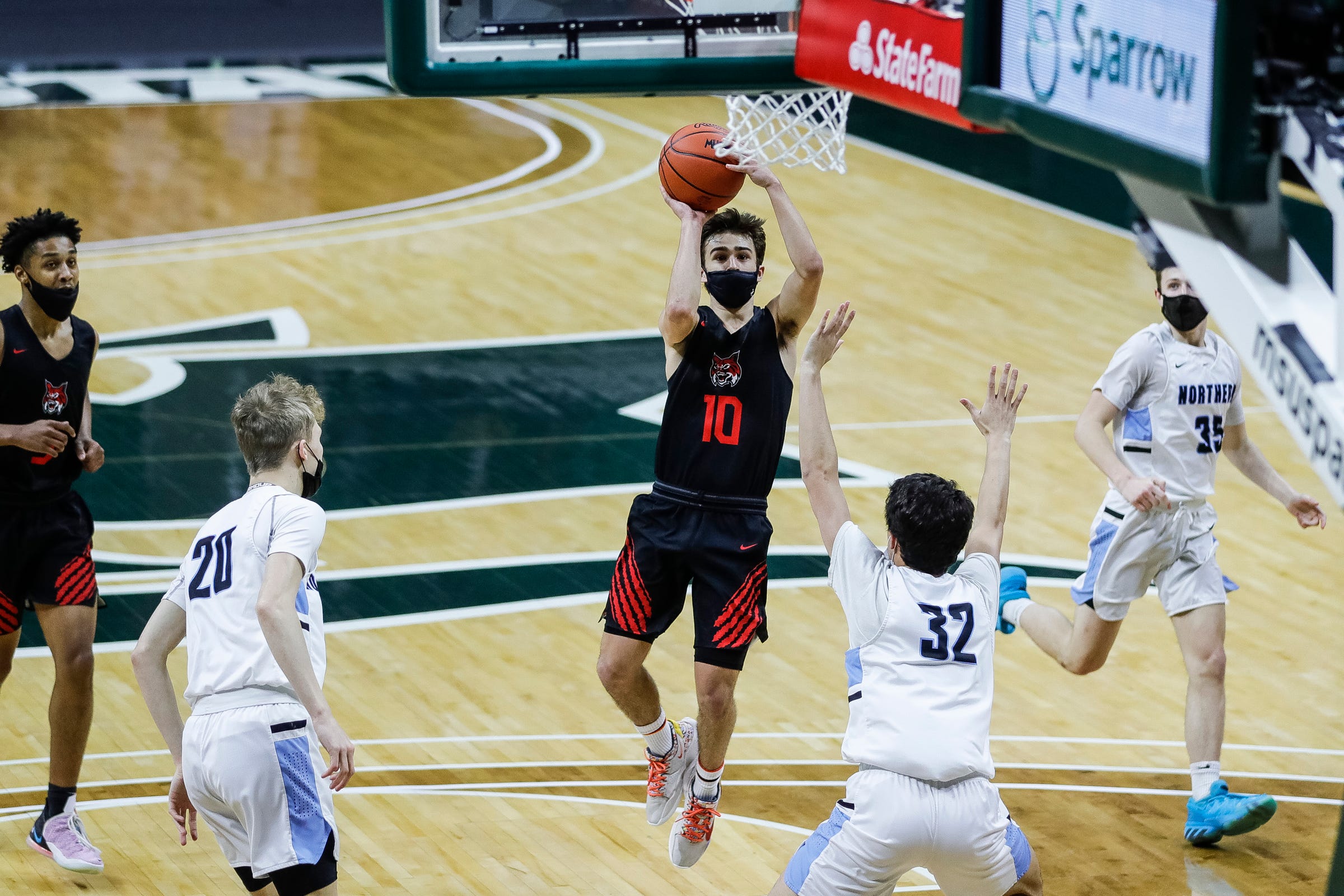 MHSAA Boys Basketball State Semis At Breslin Center: Best Photos