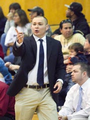 1/7/10 -- 0105111151tb hsboyshoops0108 -- McClintock head coach Jase Coburn (Cq) during their game against Tempe High at McClintock High in Tempe on Friday, January 7, 2010. (The Arizona Republic photo by Michael Schennum)