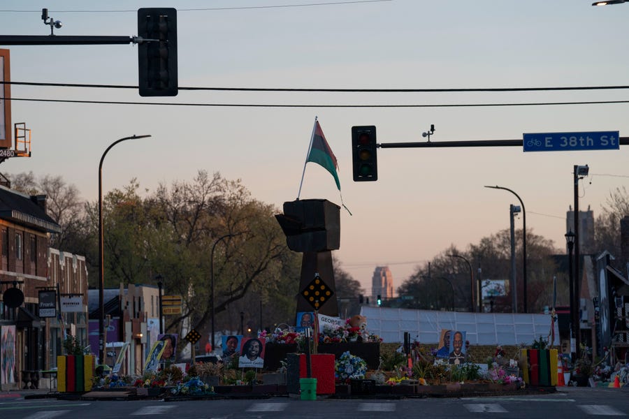 An iron first at the center of George Floyd Square in south Minneapolis, the intersection where George Floyd was killed in the hands of police.