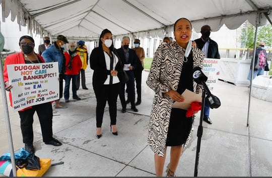 Carol Weaver, chair of the Detroit Charter Revision Commission, speaks during a press conference with community members in front of Coleman A. Young Municipal Center in Detroit on April 28.