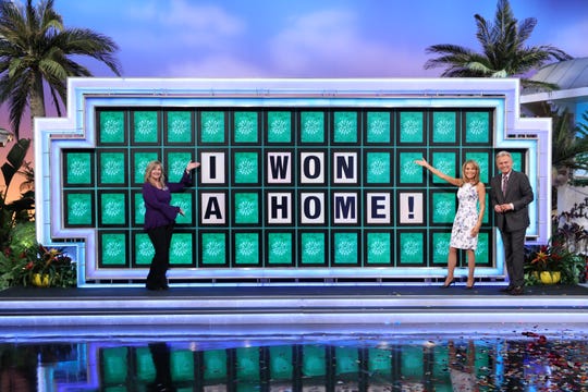 Laura Trammell made history on "Wheel of Fortune" by becoming the first person ever to win a home during the bonus round of the game show on April 27, 2021.