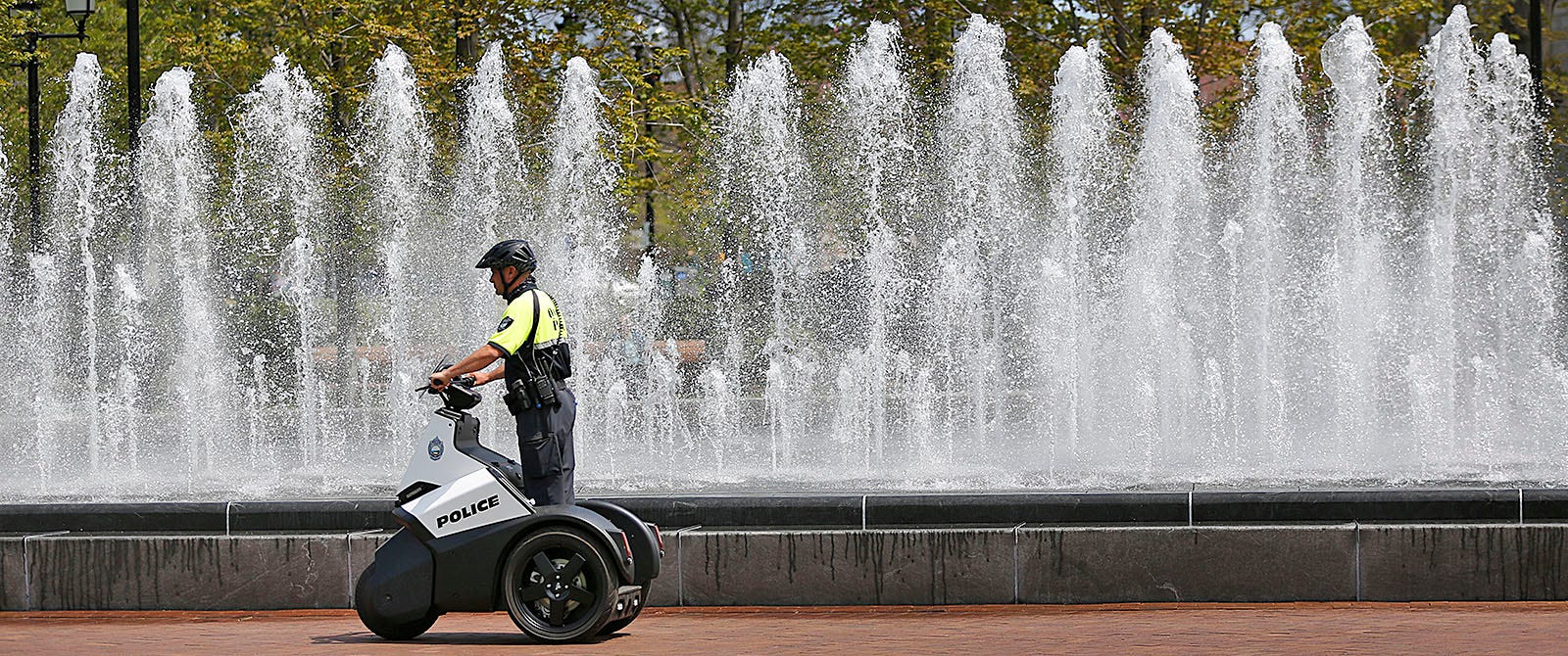 Quincy police officer Greg Hartnett patrols Hancock-Adams Common in Quincy Square using a Segway scooter Monday, May 3, 2021.