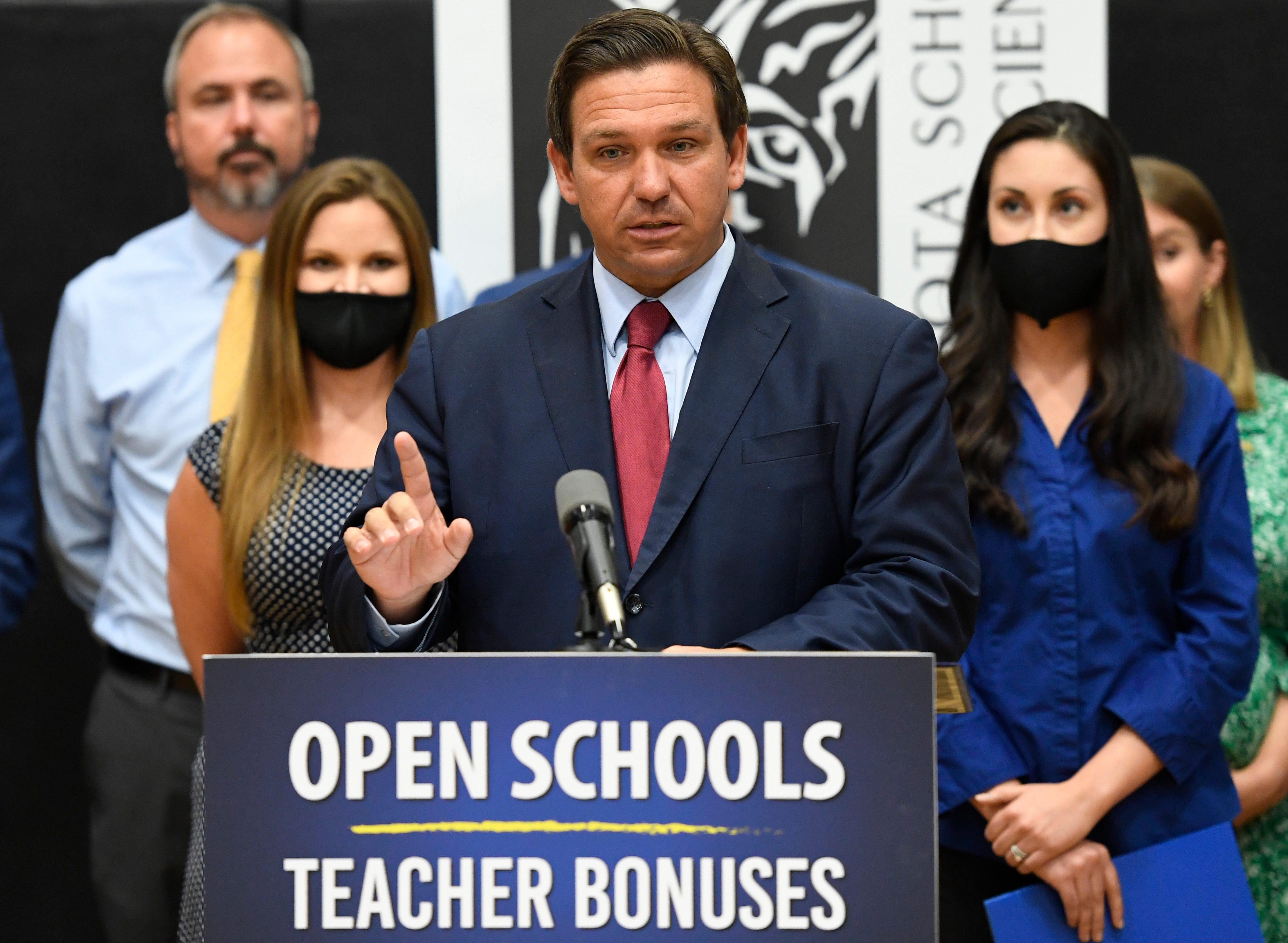 COVID Florida: Gov. Ron DeSantis Touts Teacher Bonuses, Return To Normal