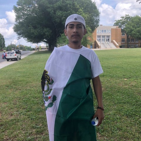 Ever Lopez, 18, says he wore the flag for his fami