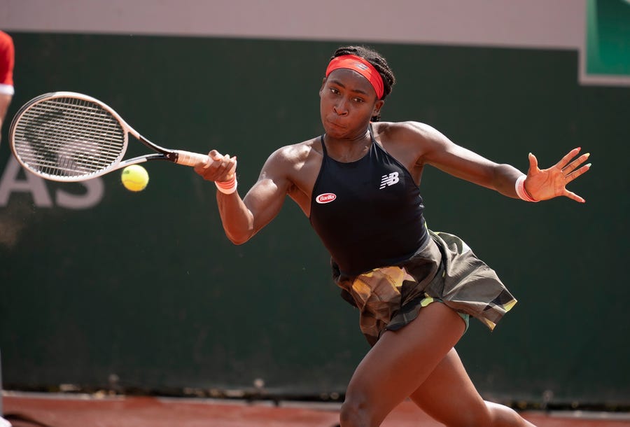 June 3: American Coco Gauff, the No. 24 seed, plays a running forehand against China's Qiang Wang during her 6-3, 7-6 (7-1) win in the second round..