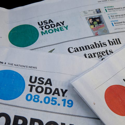 Sections of a USA TODAY newspapers.