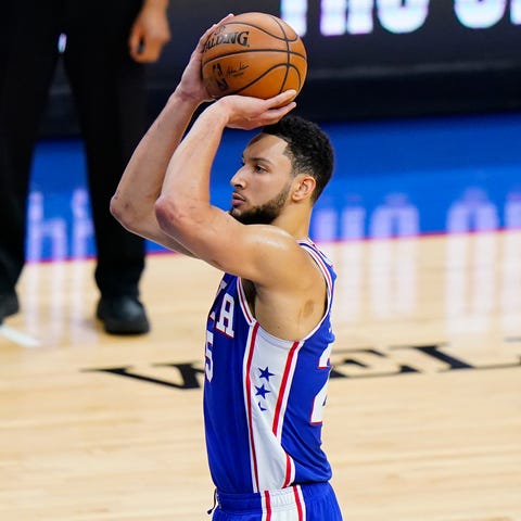 Ben Simmons attempts a free-throw after a foul by 