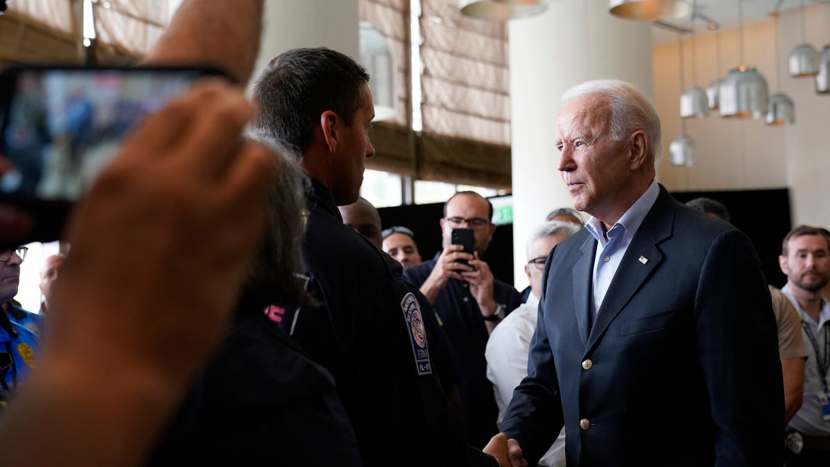 President Joe Biden meets with first responders in Miami Beach, Fla., Thursday, July 1, 2021, who were working on the condo tower that collapsed in Surfside, Fla., last week.