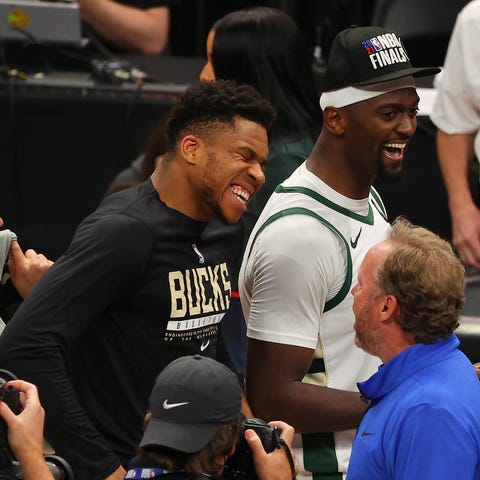 Giannis Antetokounmpo celebrates after the Bucks' 