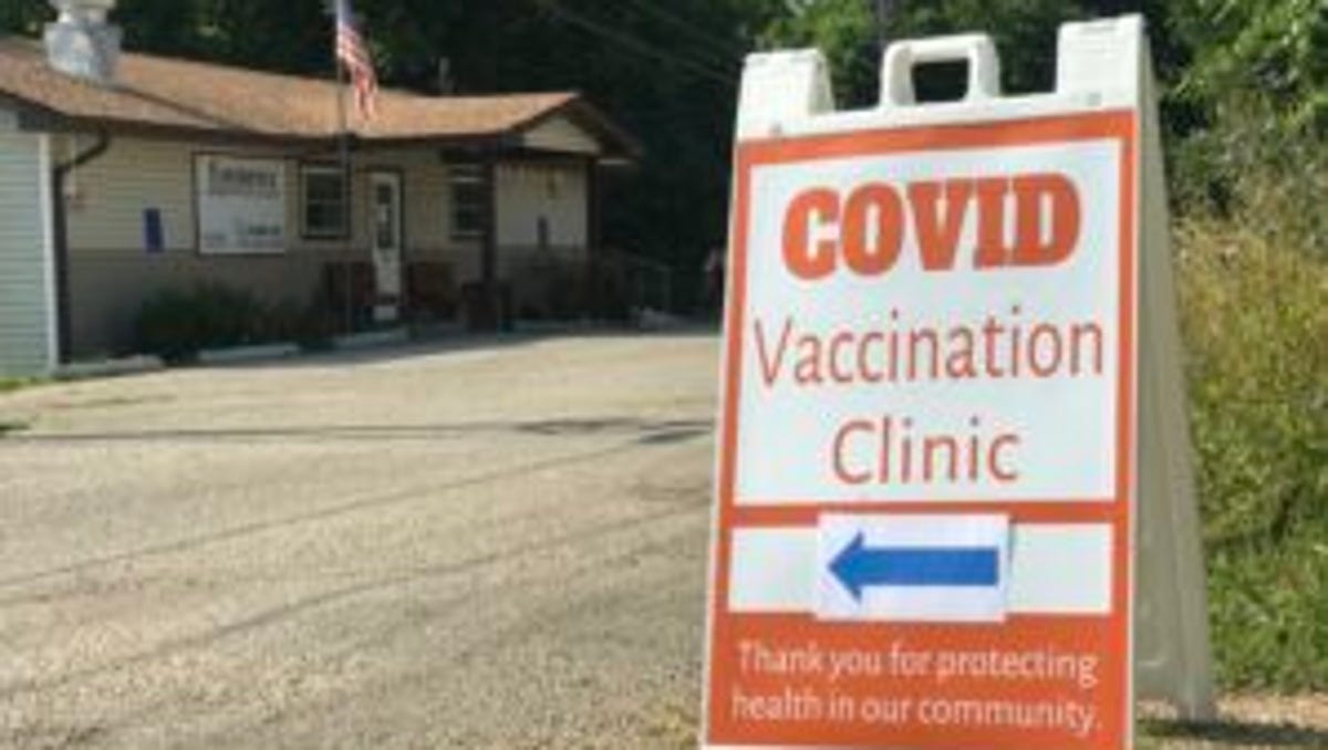 A sign marks the entrance to the a drive-through COVID-19 vaccine clinic at the Shannon County Health Center on Thursday, July 8, 2021. Photo by Tessa Weinberg/Missouri Independent